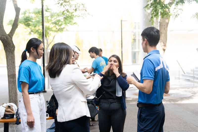 Students networking between sessions